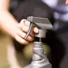 Unscrew and remove sprayer from original bottle of WEED OUT Lawn Weed Killer Spray