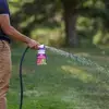 Attach garden hose to sprayer and turn valve to “Mix” position to begin spraying